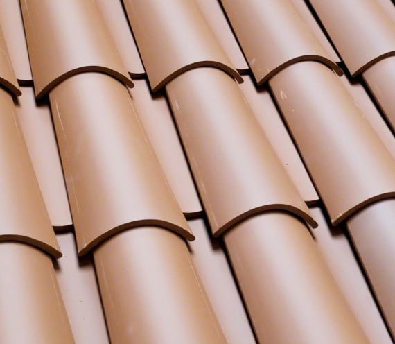 Comacast Corporation barrel roof tile manufacturer
