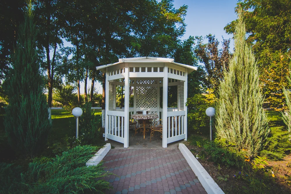 White Pavilion With Green Rooftop Garden